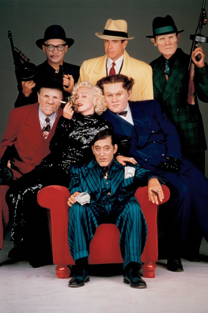American actors Henry Silva, R. G. Armstrong, Madonna, William Forsythe and Al Pacino surround Warren Beatty on the set of his movie "Dick Tracy."